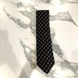 A Fantastic tie the brand is Van heusen 55 1/2 inches.